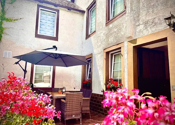 Am Brunnen Апартаменты *